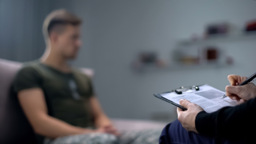 soldier with PTSD receiving treatment