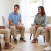 A small group sits in a bright, welcoming Southern California therapy room in soft natural light